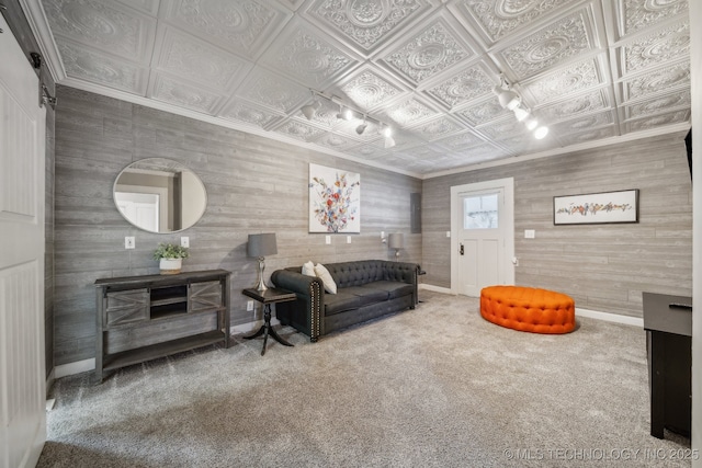 living room featuring crown molding and carpet flooring