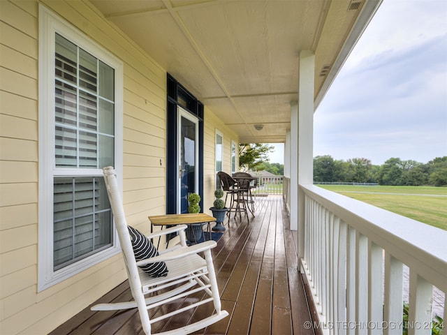 wooden deck featuring a porch