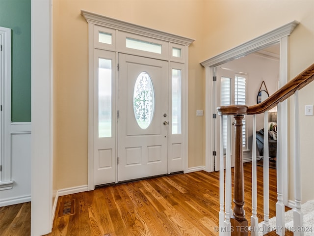 entrance foyer featuring hardwood / wood-style flooring and a wealth of natural light