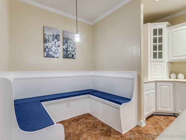 interior space featuring crown molding