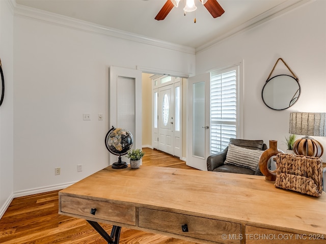 home office with crown molding, hardwood / wood-style flooring, and ceiling fan