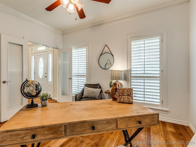 office area featuring hardwood / wood-style floors, ceiling fan, a wealth of natural light, and crown molding