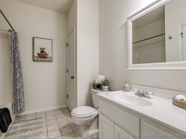 full bathroom with vanity, toilet, tile patterned floors, and shower / bathtub combination with curtain