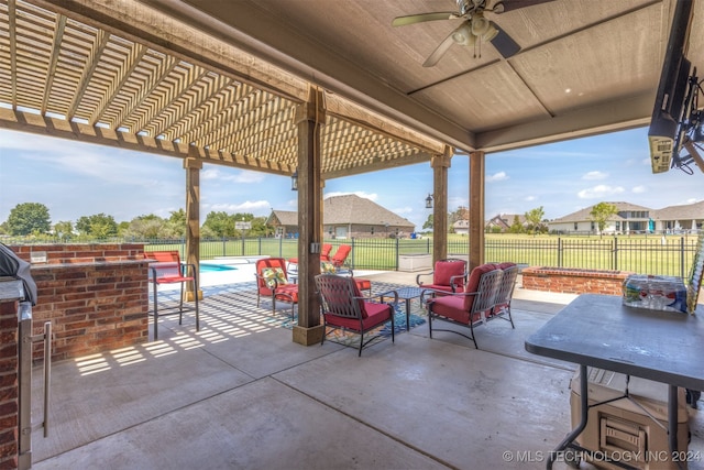 view of patio / terrace with a pergola, a fenced in pool, an outdoor living space, and ceiling fan