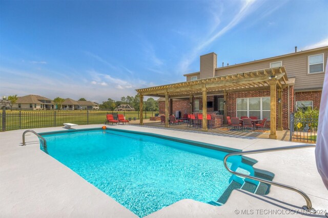 view of pool with a pergola, a diving board, and a patio