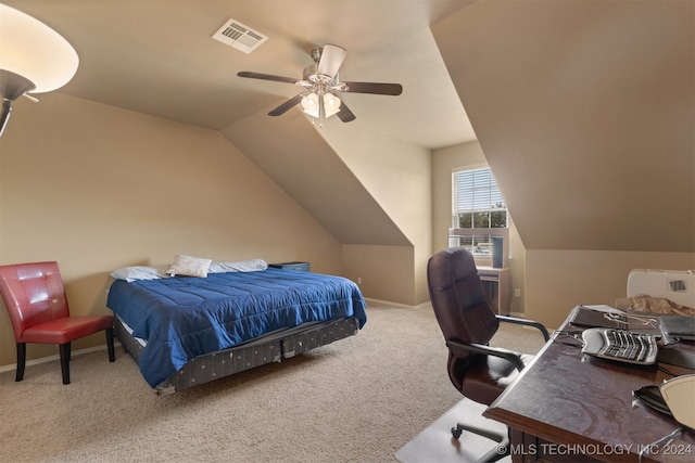 bedroom featuring ceiling fan, vaulted ceiling, and carpet flooring