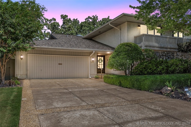 view of front of home with a garage