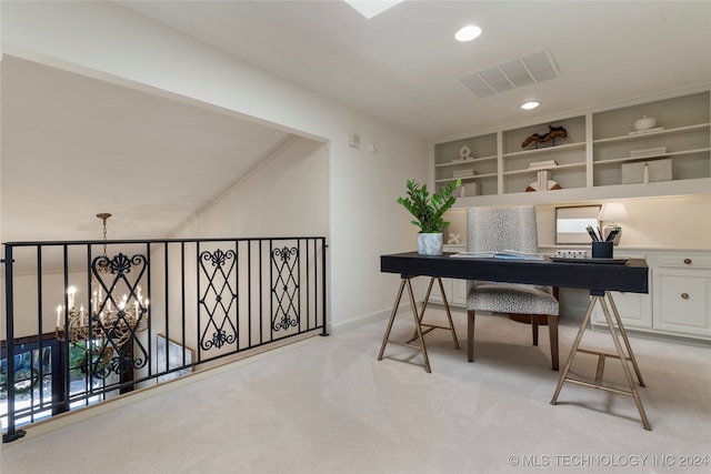 office space featuring a notable chandelier and light colored carpet