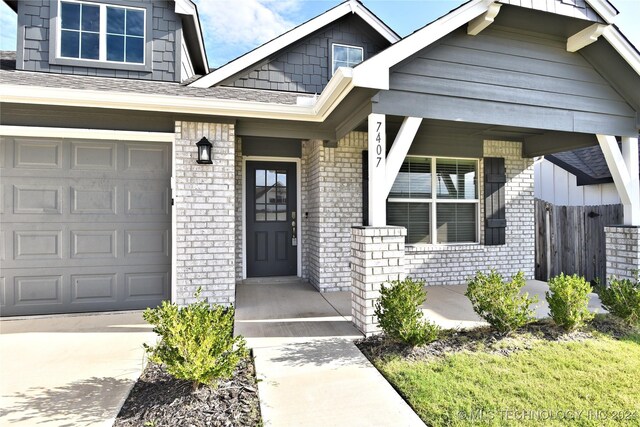 property entrance with a garage