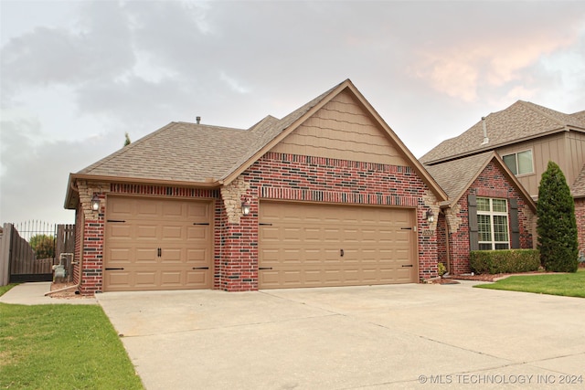 view of front of home with a garage