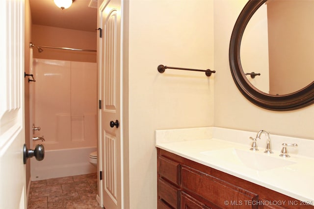 full bathroom with tile patterned flooring, toilet, vanity, and bathtub / shower combination