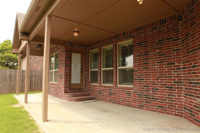 view of patio featuring ceiling fan