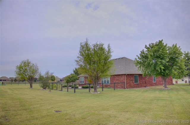 view of yard featuring fence