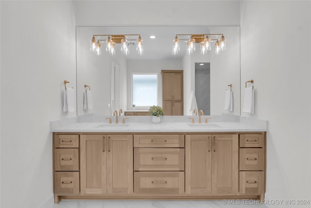 bathroom featuring tile patterned floors and vanity