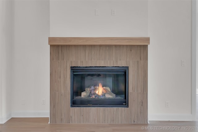 interior details featuring hardwood / wood-style flooring