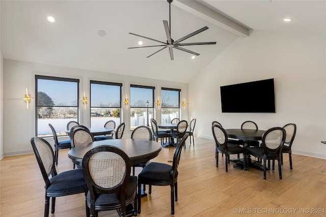 dining space with ceiling fan, high vaulted ceiling, light hardwood / wood-style flooring, and beamed ceiling