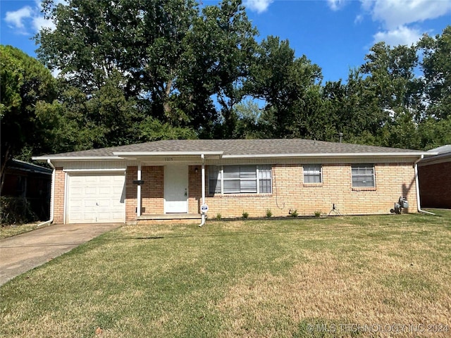 single story home featuring a garage, a shingled roof, brick siding, concrete driveway, and a front lawn