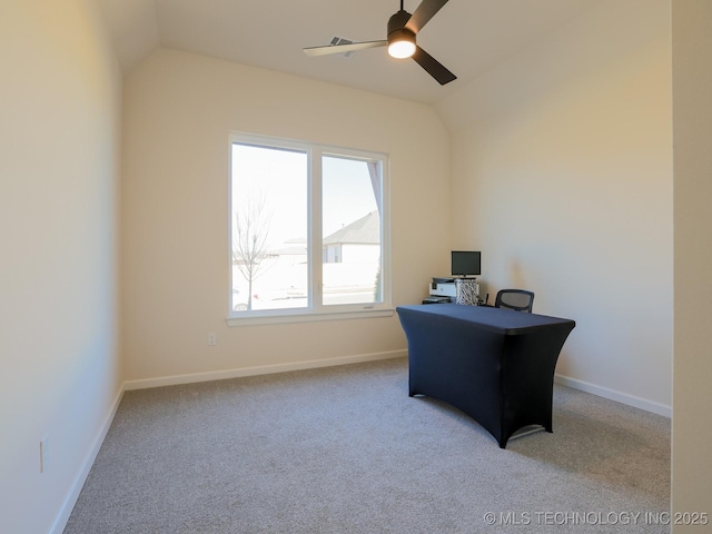 office with lofted ceiling, carpet, a ceiling fan, and baseboards