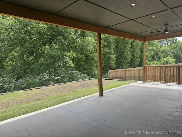 807 E Jacksonville St, Broken Arrow, OK 74012 - view of patio / terrace with a ceiling fan and a forest view