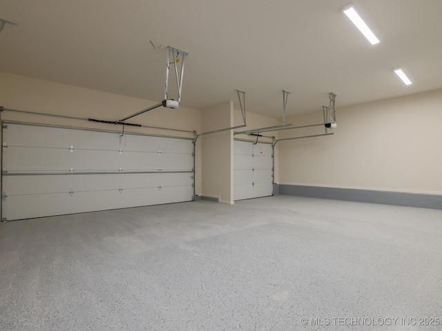 807 E Jacksonville St, Broken Arrow, OK 74012 - garage featuring a garage door opener