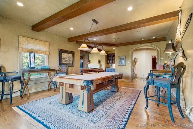 rec room with light wood-type flooring, beamed ceiling, and billiards