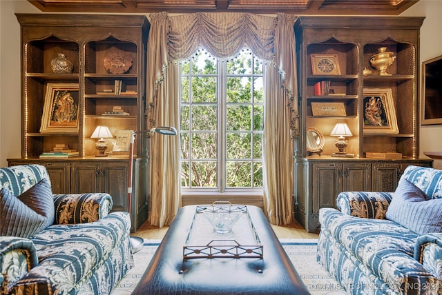 living room with light hardwood / wood-style floors and a wealth of natural light