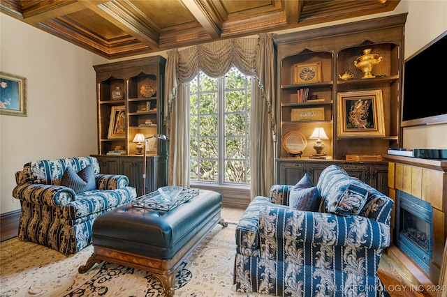 sitting room with crown molding, beamed ceiling, and coffered ceiling