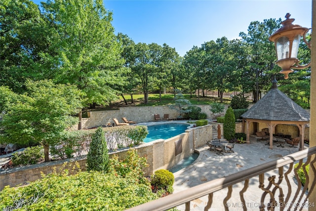 view of pool featuring a gazebo and a patio area