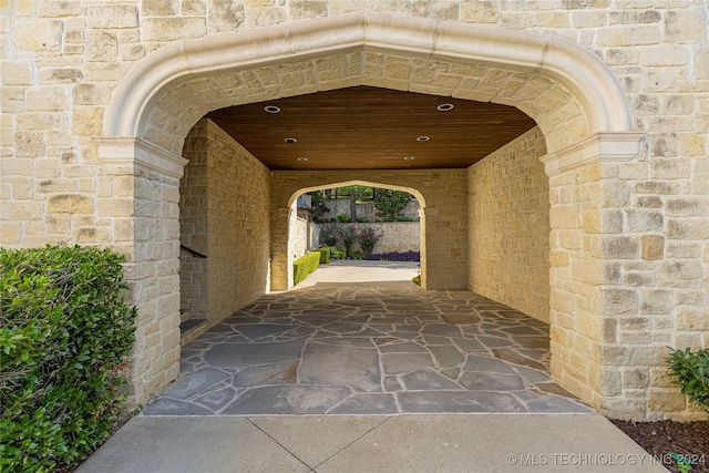 entrance to property with a carport