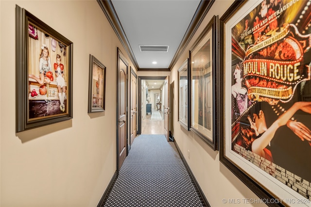 corridor featuring ornamental molding