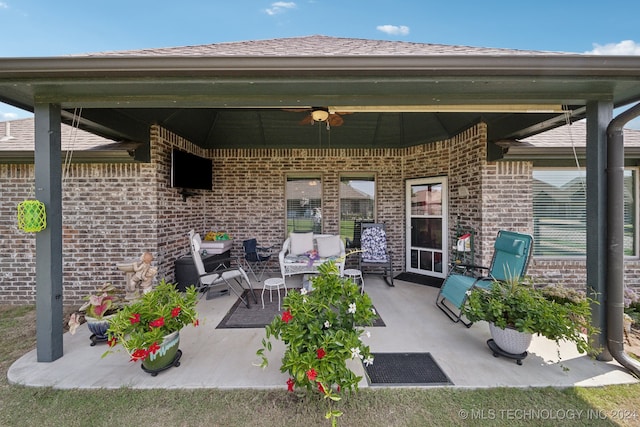 view of patio featuring ceiling fan