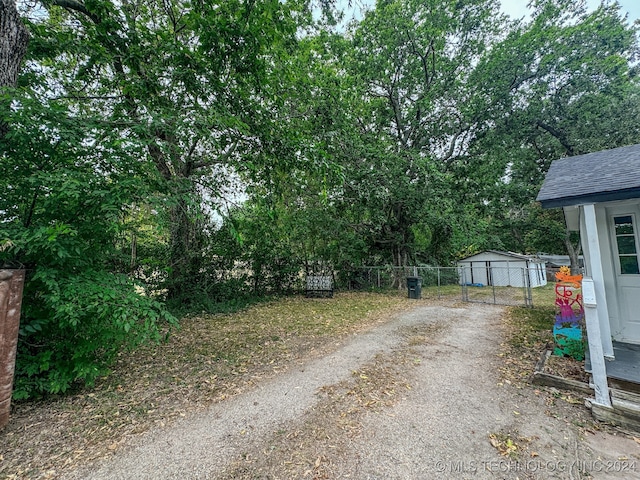 exterior space featuring an outdoor structure and a garage