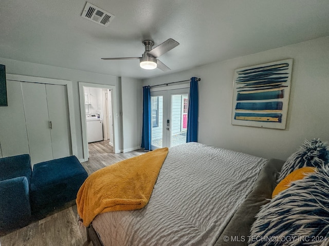 bedroom with access to outside, wood-type flooring, ceiling fan, a closet, and washer / clothes dryer