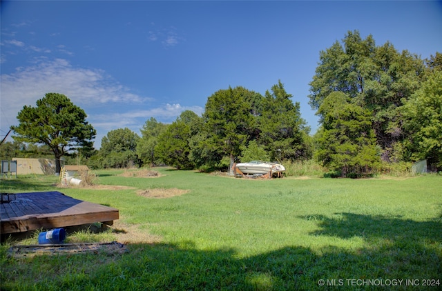 view of yard featuring a deck