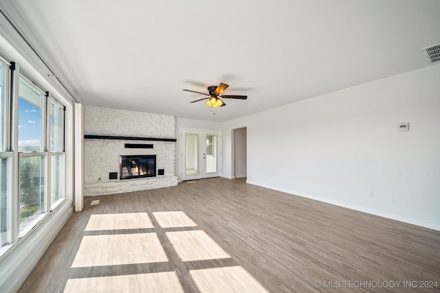 empty room with dark wood-type flooring and ceiling fan