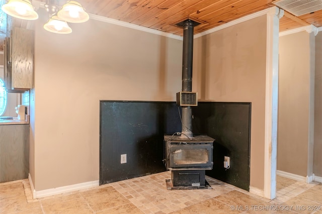 interior details featuring crown molding, wood ceiling, and a wood stove