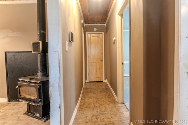 hallway featuring ornamental molding