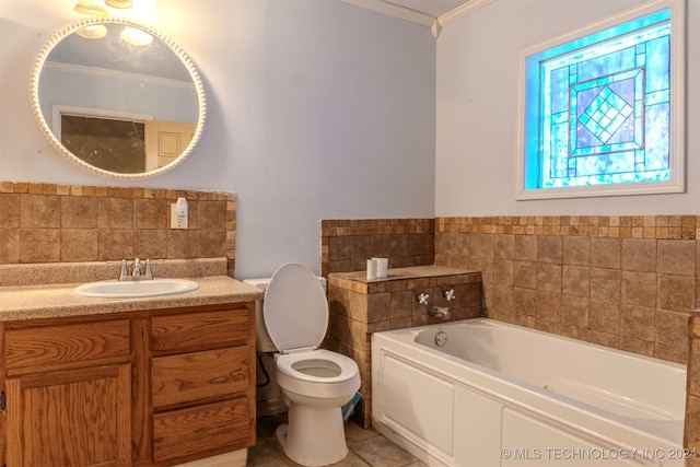 bathroom with crown molding, vanity, toilet, and a bathing tub