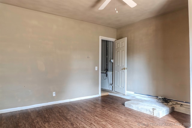 unfurnished room featuring hardwood / wood-style flooring and ceiling fan