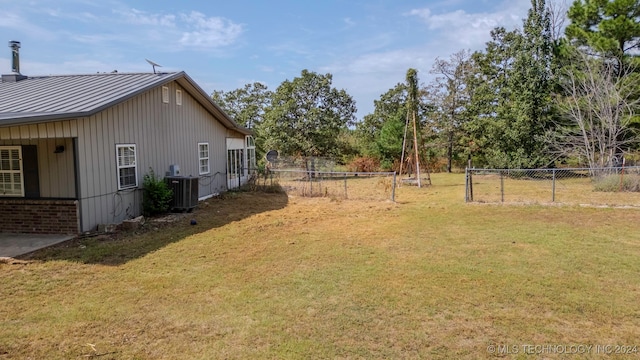 view of yard featuring central AC