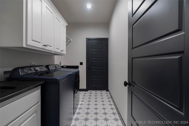 clothes washing area featuring light floors, washing machine and clothes dryer, recessed lighting, cabinet space, and baseboards