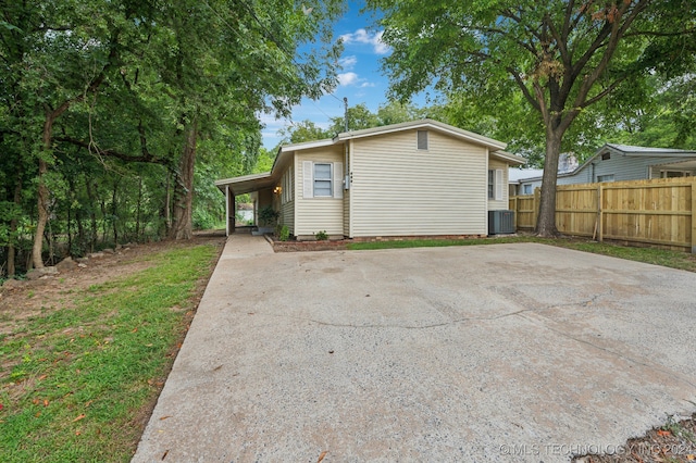 garage featuring a carport