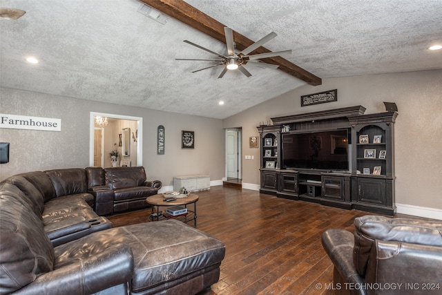 living room with lofted ceiling with beams, ceiling fan, dark hardwood / wood-style flooring, and a textured ceiling