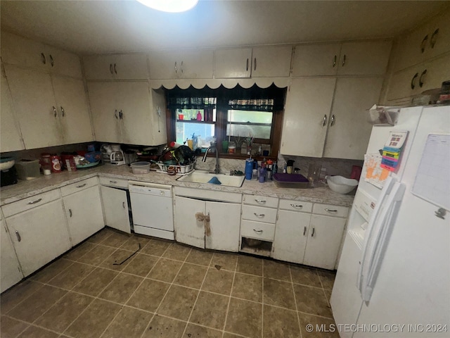 kitchen with sink, tile patterned flooring, white cabinetry, and white appliances