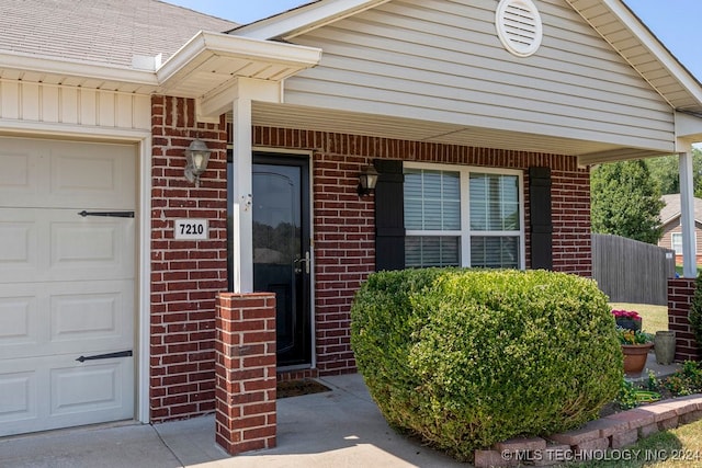 entrance to property with a garage