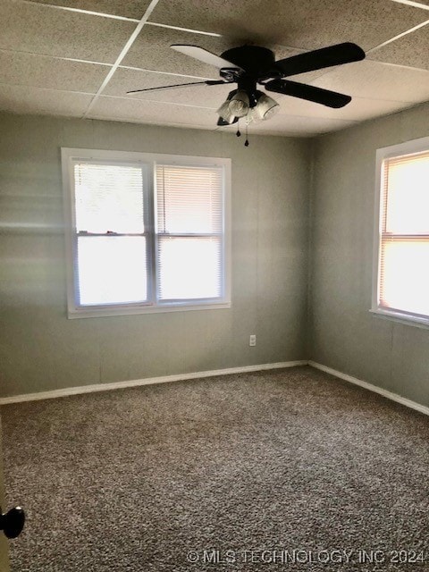 unfurnished room with ceiling fan and carpet floors