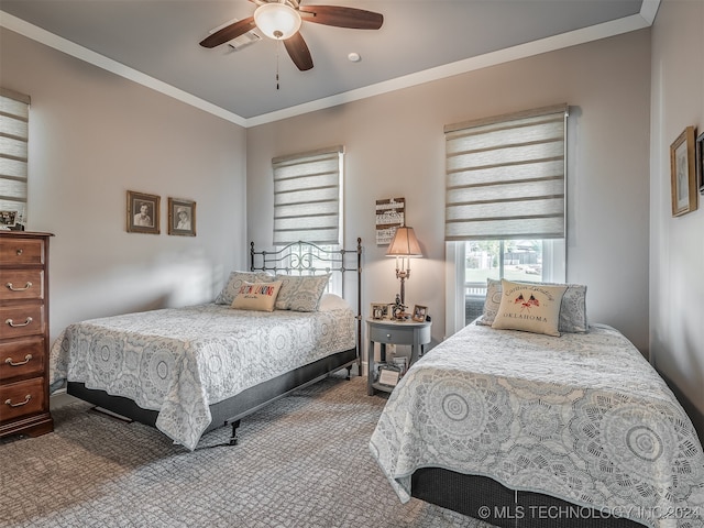 bedroom featuring carpet flooring, ceiling fan, and ornamental molding