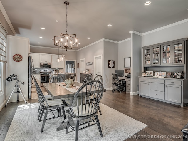 dining area featuring a notable chandelier, ornamental molding, and dark wood-type flooring