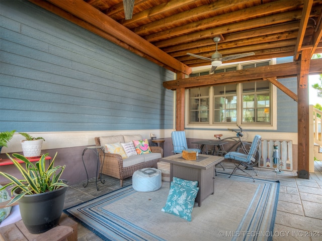 view of patio / terrace featuring outdoor lounge area and ceiling fan