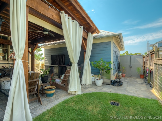 view of patio featuring a shed